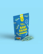 Sweet Switch Baby Shark candy package on a blue background sugar free