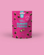 Pink packaging of Sweet Switch Almond Pearls on a pink background sugar free