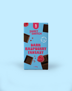 Sweet Switch Dark Raspberry Fantasy chocolate bar packaging on a light blue background sugar free