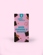 Box of Sweet Switch dark chocolate with almonds and sea salt on a pink background sugar free